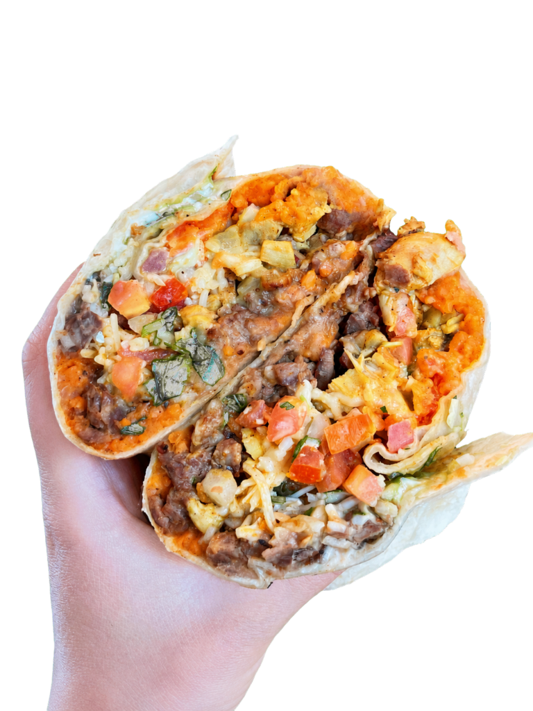 Mesquite Fresh Street Mex burrito cut in half showing mesquite-grilled steak, chicken, beans, rice, and fresh toppings.